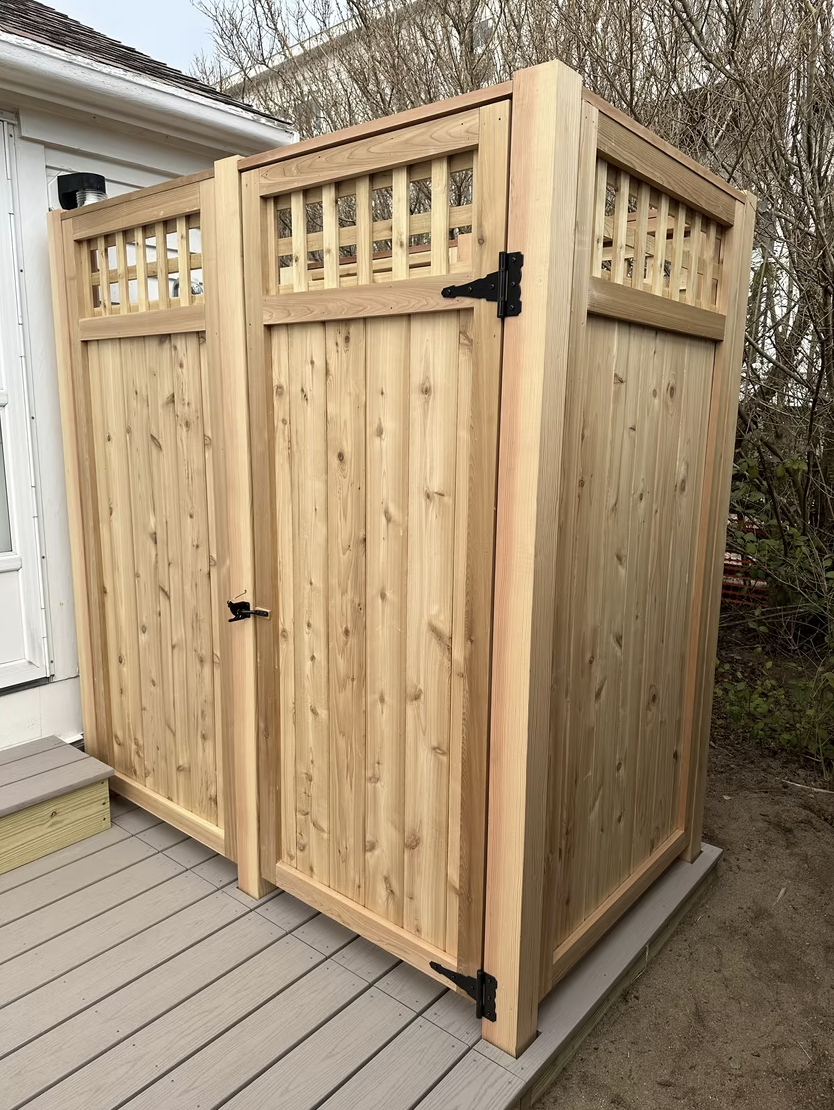 Custom cedar outdoor shower enclosure with lattice detail